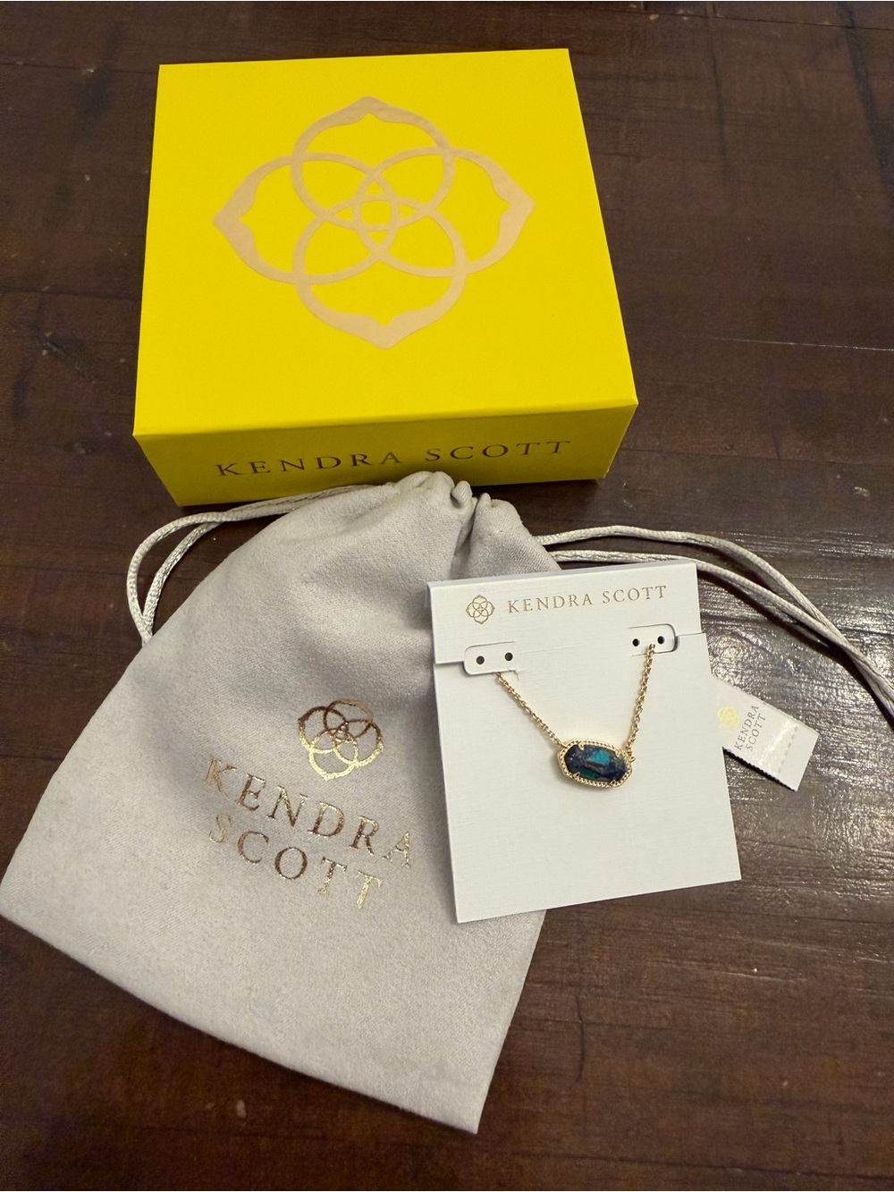 NWT Kendra Scott Gold Necklace with Iridescent Teal-Blue Stone